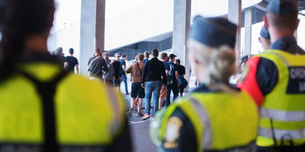 STOCKHOLM, SWEDEN - JULY 25: Players buses protected by police as frustrated fans of Djurgardens IF demanded that Pelle Olsson, head coach of Djurgardens IF, left his job, after the allsvenskan match between Djurgardens IF and GIF Sundsvall at Tele2 Arena on July 25, 2016 in Stockholm, Sweden. (Photo by Nils Petter Nilsson/Ombrello via Getty Images)