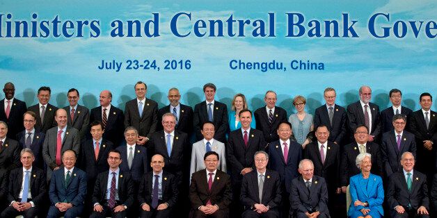 G20 Finance Ministers and Central Bank Governors pose for a group photo in Chengdu in Southwestern China's Sichuan province, Sunday, July 24, 2016. Finance Ministers and Central Bank Governors of the 20 most developed economies met in the southwestern city of Chengdu ahead of a G20 leaders meeting in September hosted by China. Participants in the front row are, from left: Britain's Chancellor of the Exchequer Philip Hammond, World Bank President Jim Yong Kim, an unidentified member, Turkey's Deputy Prime Minister Mehmet Simsek, China's Finance Minister Lou Jiwei, China's People's Bank of China Governor Zhou Xiaochuan, Germany's Federal Minister of Finance Wolfgang Schauble, International Monetary Fund Managing Director Christine Lagarde and OECD Secretary-General Angel Gurria. (AP Photo/Ng Han Guan, Pool)