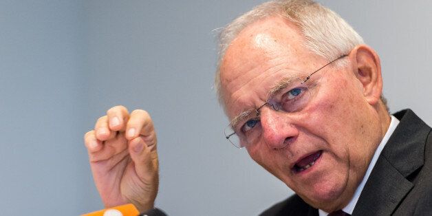 German Finance Minister Wolfgang Schauble addresses the media after a meeting of EU economy and finance ministers at the EU Council building in Luxembourg on Tuesday, Oct. 6, 2015. (AP Photo/Geert Vanden Wijngaert)