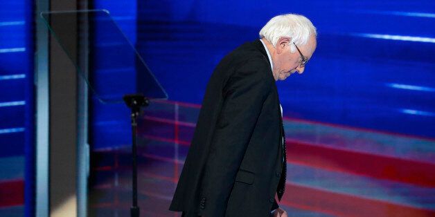 Former Democratic presidential candidate, Sen. Bernie Sanders, I-Vt., walks off the stage during the first day of the Democratic National Convention in Philadelphia , Monday, July 25, 2016. (AP Photo/J. Scott Applewhite)