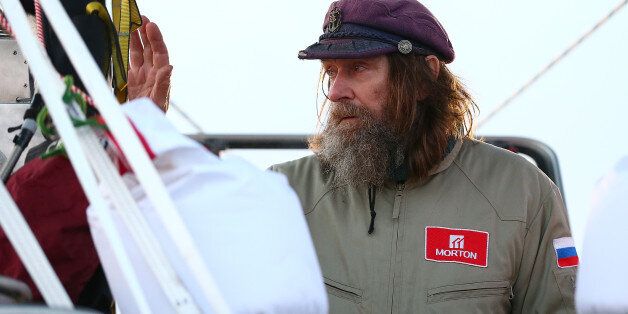 NORTHAM, AUSTRALIA - JULY 12: Fedor Konyukhov waves to spectators before lift off from the Northam Aero Club on July 12, 2016 in Northam, Australia. The 65 year old Russian adventurer aims to set a new world record by circumnavigating the globe without touching down in under 13 days. The current record of 13.5 days was set by American aviator Steve Fossett in 2002. Fedor Konyukhov will travel almost 33,000km in his balloon Rosiere balloon 'Morton' which is 52 metres high and weighs 1,600kg. (Photo by Paul Kane/Getty Images)