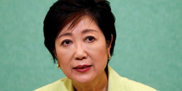 Former defense minister Yuriko Koike, a candidate planning to run in the Tokyo Governor election, attends a joint news conference with other potential candidates at the Japan National Press Club in Tokyo, Japan July 13, 2016. REUTERS/Issei Kato/Files