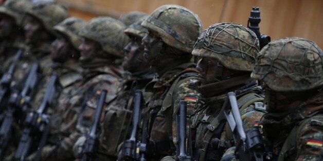 German Bundeswehr army soldiers demonstrate their skills at Kaserne Hochstaufen (mountain infantry military barracks) in Bad Reichenhall, southern Germany, March 23, 2016. REUTERS/Michaela Rehle