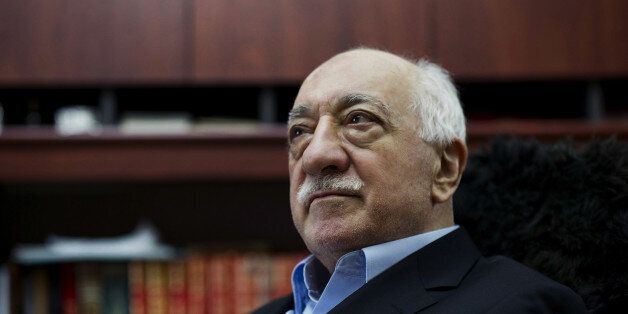 FILE - In this March 15, 2014 file photo, Turkish Muslim cleric Fethullah Gulen, sits at his residence in Saylorsburg, Pa. A lawyer for the Turkish government, Robert Amsterdam, said that