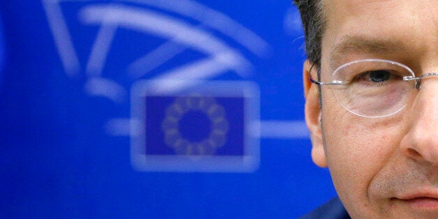 Eurogroup Chairman and Dutch Finance Minister Jeroen Dijsselbloem waits to testify before the European Parliament's Economic and Monetary Affairs Committee in Brussels February 24, 2015. Euro zone ministers could consider further debt relief measures for Greece if the country meets all the criteria specified in the NOvember 2012 decision of euro zone finance ministers, Dijsselbloem said on Tuesday. REUTERS/Francois Lenoir (BELGIUM - Tags: POLITICS BUSINESS PROFILE TPX IMAGES OF THE DAY)