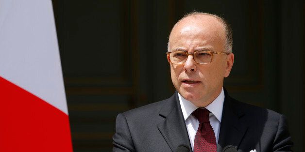 French Interior Minister Bernard Cazeneuve speaks at the ministry in Paris, France, June 22, 2016 after he authorised a short route allowing French trade unions to hold a protest march against labour reforms in the French capital on Thursday after an earlier decision to ban the demonstration. REUTERS/Stephane Mahe