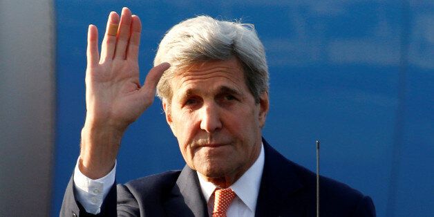 U.S. Secretary of State John Kerry waves before getting into a car upon his arrival at Vnukovo International Airport in Moscow, Russia, July 14, 2016. REUTERS/Sergei Karpukhin
