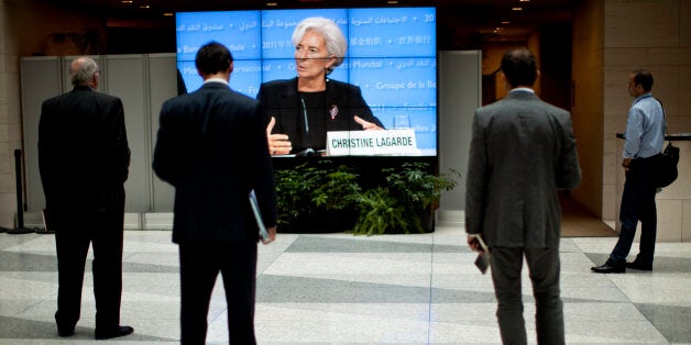 International Monetary Fund Managing Director Christine Lagarde is seen on a screen speaking during a press briefing after the International Monetary and Financial Committee (IMFC) meeting at the annual International Monetary Fund and World Bank meetings September 24, 2011 in Washington, DC. AFP PHOTO/Brendan SMIALOWSKI (Photo credit should read BRENDAN SMIALOWSKI/AFP/Getty Images)