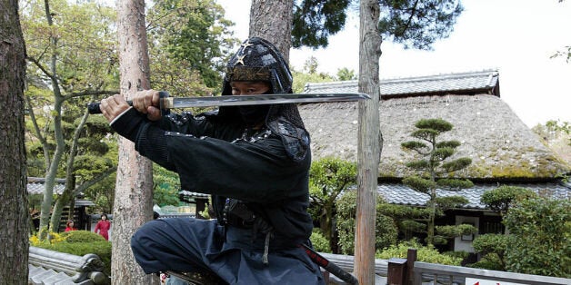 UENO, JAPAN: An authentic master of ninjutsu martial art, Kazuki Ukita poses in Ninja costume at the Ninja museum's Ninja residence in the small ancient city of Ueno 08 April 2002. South African national football team selected its base camp in Ueno city, Mie Prefecture for upcoming FIFA 2002 World Cup Korea/Japan. South Africa will play Spain, Slovenia and Paraguay in Group B in the first round of the World Cup. AFP PHOTO / TOSHIFUMI KITAMURA (Photo credit should read TOSHIFUMI KITAMURA/AFP/Getty Images)