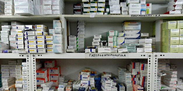 Medicines which have been donated by people are seen on shelves of a makeshift pharmacy at a medical centre of the Greek Delegation of the Doctors of the World in Athens May 31, 2012. Greece's rundown state hospitals are cutting off vital drugs, limiting non-urgent operations and rationing even basic medical materials for exhausted doctors as a combination of economic crisis and political stalemate strangle health funding. With Greece now in its fifth year of deep recession, trapped under Europe's biggest public debt burden and dependent on international help to keep paying its bills, the effects are starting to bite deeply into vital services. Picture taken May 31, 2012. REUTERS/Yorgos Karahalis (GREECE - Tags: BUSINESS HEALTH SOCIETY) ATTENTION EDITORS: PICTURE 06 of 25 FOR PACKAGE 'GREEK HEALTH SYSTEM CRUMBLES'. SEARCH 'RUNDOWN STATE HOSPITALS' TO FIND ALL IMAGES