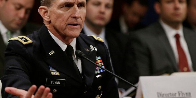 Defense Intelligence Agency director U.S. Army Lt. General Michael Flynn testifies before the House Intelligence Committee on