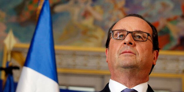 French President Francois Hollande leaves the Elysee Palace after a security meeting in Paris, Friday, July 15, 2016. French Prime Minister Manuel Valls said the government is declaring three days of national mourning after the attack in Nice that left at least 84 people dead. Speaking after an emergency meeting, Valls said the national mourning would begin Saturday. (AP Photo/Thibault Camus)