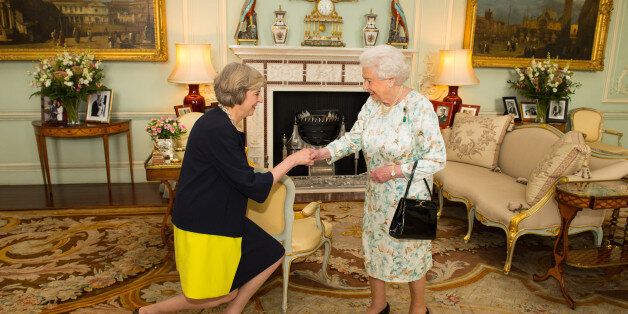 LONDON, ENGLAND - JULY 13: Queen Elizabeth II welcomes Theresa May at the start of an audience where she invited the former Home Secretary to become Prime Minister and form a new government at Buckingham Palace on July 13, 2016 in London, England. Former Home Secretary Theresa May becomes the UK's second female Prime Minister after she was selected unopposed by Conservative MPs to be their new party leader. She is currently MP for Maidenhead. (Photo by Dominic Lipinski - WPA Pool/Getty Images)