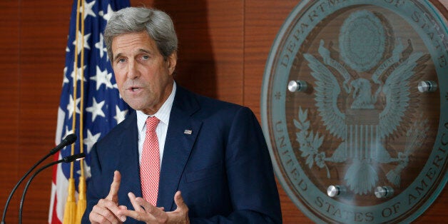 Secretary of State John Kerry speaks at the Washington Passport Agency, Tuesday, July 12, 2016 in Washington. (AP Photo/Alex Brandon)