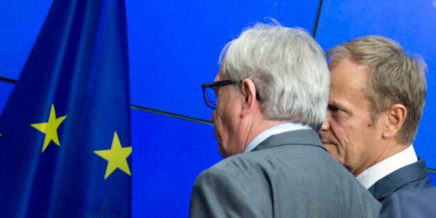 European Commission President Jean-Claude Juncker, left, and European Council President Donald Tusk leave after a final media conference at an EU summit in Brussels on Wednesday, June 29, 2016. European Union leaders are meeting without Britain for the first time since the British referendum to rethink their bloc and keep it from disintegrating after Britainâs unprecedented vote to leave. (Geoffroy Van der Hasselt)