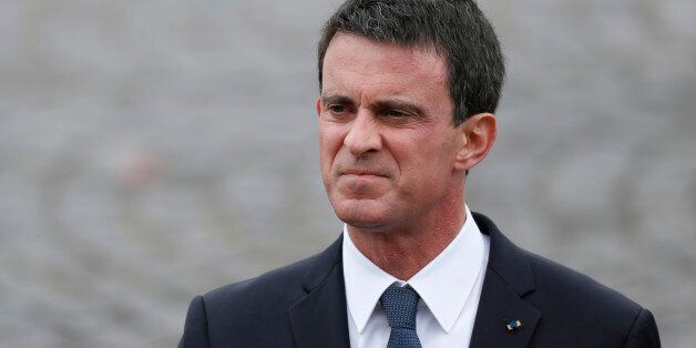 French Prime Minister Manuel Valls attends the Bastille Day military parade on the Champs-Elysees in Paris, France, July 14, 2016. REUTERS/Benoit Tessier
