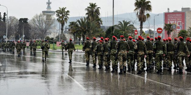 Soldiers of the Greek Army parade in the center of Thessaloniki during the anniversary of Greek Independence day of 25th March. The OTE Tower is seen at the background, Greece