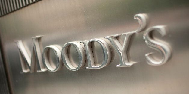 The Moody's Investors Service Inc. logo is displayed outside of the company's headquarters in New York, U.S., on Thursday, July 28, 2011. Moody's Investors Service, Standard & Poor's and Fitch Ratings have said they may consider lowering the nation's top rating if officials fail to resolve the stalemate. Photographer: Scott Eells/Bloomberg via Getty Images