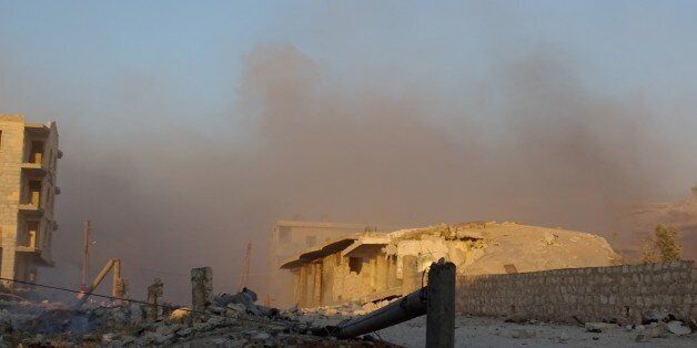 ALEPPO, SYRIA - JULY 10: Smoke rises after the Russian warcrafts hit the Kafr Hamra village in northen Aleppo, Syria on July 10, 2016. (Photo by Ahmed Muhammed Ali/Anadolu Agency/Getty Images)