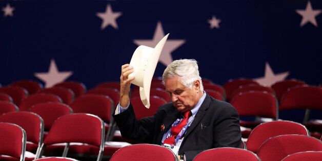 CLEVELAND, OH - JULY 18: Tom Pauken, Republican Delegate of Texas takes off his hat before the start of the first day of the Republican National Convention on July 18, 2016 at the Quicken Loans Arena in Cleveland, Ohio. An estimated 50,000 people are expected in Cleveland, including hundreds of protesters and members of the media. The four-day Republican National Convention kicks off on July 18. (Photo by John Moore/Getty Images)