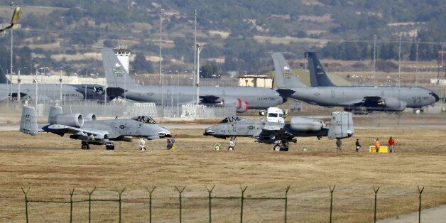 U.S. Air Force A-10 Thunderbolt II fighter jets (foreground) are pictured at Incirlik airbase in the southern city of Adana, Turkey, in this December 11, 2015 file photo. REUTERS/Umit Bektas/Files
