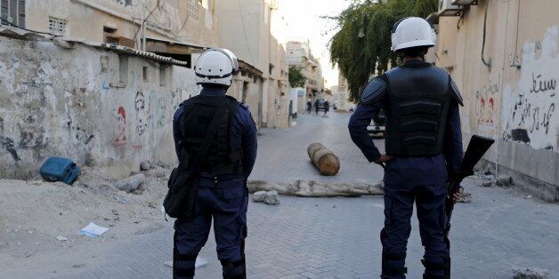Riot police patrol the streets to keep protesters from gathering to demonstrate against the execution of Shi'ite cleric Nimr al-Nimr in Saudi Arabia, in the village of Sanabis, west of Manama, Bahrain January 4, 2016. REUTERS/Hamad I Mohammed