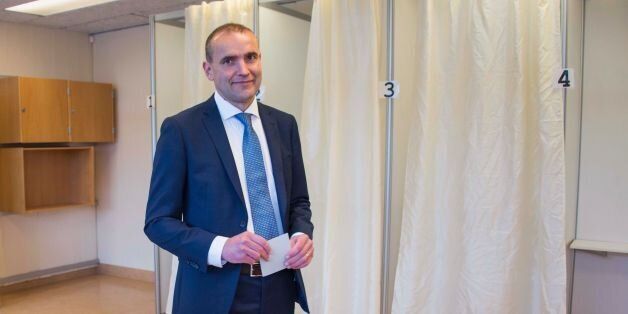Presidential candidate Gudni Johannesson casts his ballot at a polling station in Reykjavik, on June 25, 2016.Iceland began voting in a presidential election, two months after the Panama Papers scandal tainted part of the political elite, with newcomer Gudni Johannesson seen clinching an easy victory. / AFP / HALLDOR KOLBEINS (Photo credit should read HALLDOR KOLBEINS/AFP/Getty Images)