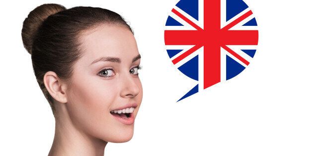 Beautiful woman speak.Bubble with Britain flag. Isolated background.
