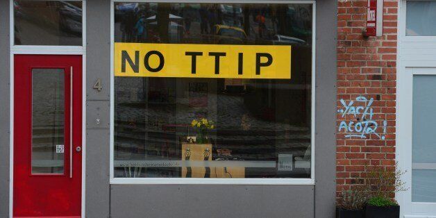 A small hotel has put up a sign against the TTIP (Transatlantic Trade and Investment Partnership), the proposed free trade agreement between the European Union and the United States during the G7 foreign ministers' meeting in Luebeck, northern Germany, on April 14, 2015. The foreign ministers come together in Luebeck to discuss key global political and security issues ahead of a G7 summit to take place in June 2015 in southern Germany. The G7 is a grouping of the seven biggest economic powers in the world -- Germany, Canada, the United States, France, Italy, Japan, Britain -- excluding China. AFP PHOTO / JOHN MACDOUGALL (Photo credit should read JOHN MACDOUGALL/AFP/Getty Images)