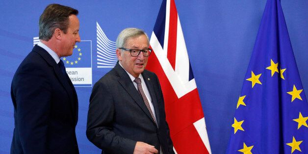 Britain's Prime Minister David Cameron (L) and European Commission President Jean-Claude Juncker arrives at the EU Summit in Brussels, Belgium, June 28, 2016. REUTERS/ Francois Lenoir