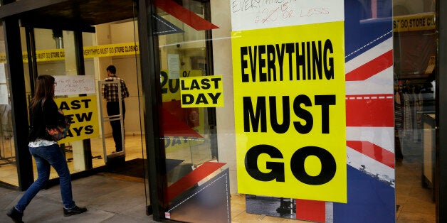 A store closing sale banner stating