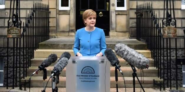 Scotland's First Minister and Leader of the Scottish National Party (SNP), Nicola Sturgeon, addresses the media after holding an emergency Cabinet meeting at Bute House in Edinburgh, Scotland on June 25, 2016, following the pro-Brexit result of the UK's EU referendum vote.The result of Britain's June 23 referendum vote to leave the European Union (EU) has pitted parents against children, cities against rural areas, north against south and university graduates against those with fewer qualifications. London, Scotland and Northern Ireland voted to remain in the EU but Wales and large swathes of England, particularly former industrial hubs in the north with many disaffected workers, backed a Brexit. / AFP / OLI SCARFF (Photo credit should read OLI SCARFF/AFP/Getty Images)
