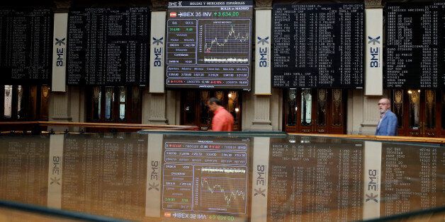 Electronic boards are seen at the Madrid stock exchange which plummeted after Britain voted to leave the European Union in the EU BREXIT referendum, in Madrid, Spain, June 24, 2016. REUTERS/Andrea Comas
