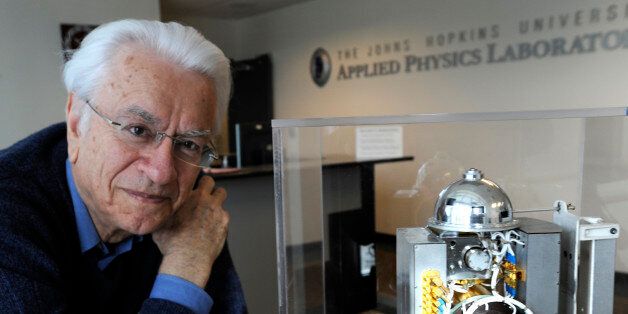 Stamatios M. Krimigis, of the Johns Hopkins University Applied Physics Laboratory, is pictured with the Voyager spacecraft's backup flight unit, which was never used, January 10, 2011, in Laurel, Maryland. (Jed Kirschbaum/Baltimore Sun/MCT via Getty Images)