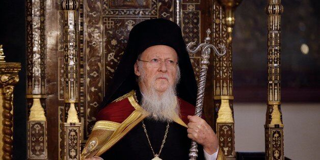 FILE - In this Wednesday, Jan. 6, 2016 file photo, Ecumenical Patriarch Bartholomew I, the spiritual leader of the world's Orthodox Christians listens during an Epiphany ceremony at the Patriarchate in Istanbul, Turkey. Plans to bring together leaders of all the world's Orthodox churches for the first time in more than a millennium appear in jeopardy amid the wrangling over the meeting's agenda, with the Russian Orthodox Church warning that the gathering would make no sense if at least one church fails to attend. (AP Photo/Emrah Gurel, file)
