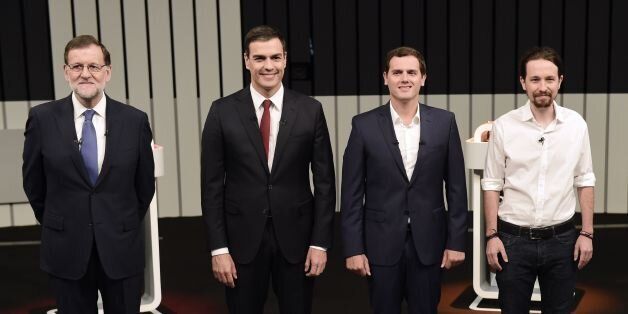 (L to R) Leader of the People's Party (PP) and Spain's caretaker Prime Minister and party candidate, Mariano Rajoy, Leader of Spanish Socialist Party (PSOE), Pedro Sanchez, Center-right party Ciudadanos leader and party candidate, Albert Rivera,(C), and Leader of left wing party Podemos and party candidate, Pablo Iglesias, pose prior to a televised debate at the congress centre IFEMA in Madrid on June 13, 2016 ahead of Spain's general election.Spain is holding its second elections in six months,