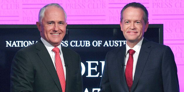 FILE - In this May, 29, 2016, file photo, Australia's Prime Minister Malcolm Turnbull, left, and opposition leader Bill Shorten shake hands as they arrive for a debate in Canberra. Australians go to the polls Saturday, July 2, 2016, with the opposition leader vying to become the country's fifth prime minister in three years. (Tracey Nearmy/Pool Photo via AP, File)