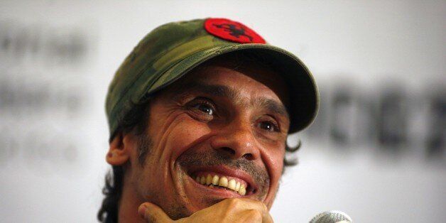 French-born performer and political activist Manu Chao addresses the media during a press conference at the Guadalajara International Film Festival in Guadalajara, Mexico, Tuesday, March 24, 2009. (AP Photo/Ricardo Arduengo)