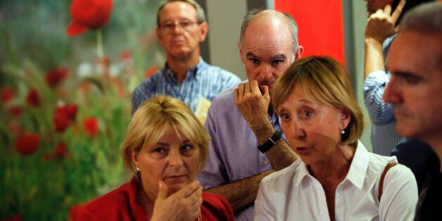 People wait for election results at Spain's Socialist Party (PSOE) headquarters after polling stations closed in Spain's general election in Madrid, Spain, June 26, 2016. REUTERS/Susana Vera