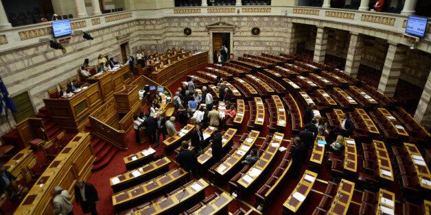 (GERMANY OUT) The Hellenic Parliament deciding the prior actions in form of one law for the negotiation and conclusion of an agreement with the European Support Mechanism (E.M.S). Athens on July 15, 2015 (Photo by Wassilis Aswestopoulos/ullstein bild via Getty Images)