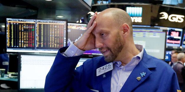 Specialist Meric Greenbaum works at his post on the floor of the New York Stock Exchange, Friday, June 24, 2016. U.S. stocks are plunging in early trading after Britons voted to leave the European Union. (AP Photo/Richard Drew)