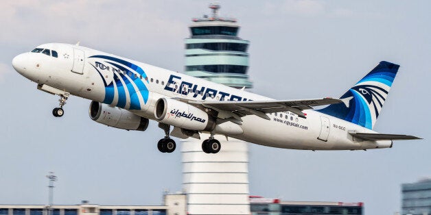 FILE -- This August 21, 2015 file photo shows an EgyptAir Airbus A320 with the registration SU-GCC taking off from Vienna International Airport, Austria. Egyptians officials say a bomb threat has forced an EgyptAir airliner en route to Beijing from Cairo to make an emergency landing in Uzbekistan, where the aircraft is being searched. (AP Photo/Thomas Ranner, File)