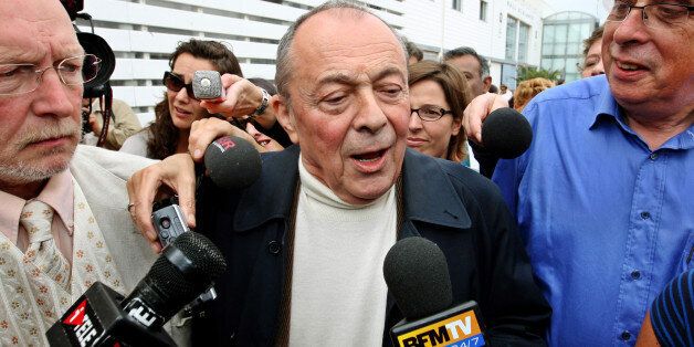 French Former socialist Prime Minister Michel Rocard speaks to journalists as he arrives at the Socialist Party's Summer School in La Rochelle, southwestern France, Friday, Aug. 31, 2007. Socialist Party militants met in La rochelle to try to renovate the floundering party after their defeat in the presidential election. (AP Photo/Bob Edme)