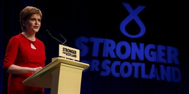 Scotland's First Minister and leader of the Scottish National Party (SNP) Nicola Sturgeon speaks at the SNP's annual conference in Aberdeen, Scotland, October 17, 2015. Sturgeon accused Prime Minister David Cameron of playing 'fast and loose' with Britain's place in the European Union on Saturday, criticising his renegotiation strategy before a public vote on remaining an EU member. Britain's future in Europe has become a defining issue for the country. Cameron has promised to negotiate new memb