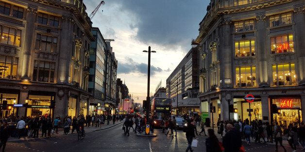 Oxford Circus at dusk with crowds of people