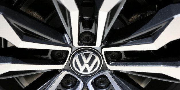 The wheel hub of a Volkswagen Tiguan R line automobile sits on display at the Volkswagen AG (VW) annual general meeting (AGM) in Hannover, Germany, on Wednesday, June 22, 2016. Matthias Mueller, chief executive officer of Volkswagen AG, sought to appease shareholder anger over the worst crisis in the carmakers history by shoring up internal controls to prevent a repeat of the diesel-emissions scandal. Photographer: Krisztian Bocsi/Bloomberg via Getty Images