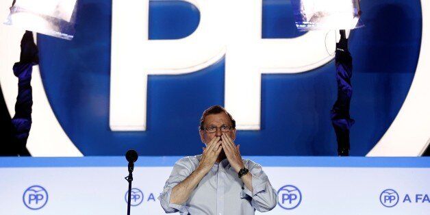 MADRID, SPAIN - JUNE 26: Spanish leader of the People's Party Mariano Rajoy addresses their supporters from the partyÂ´s headquarters after the announcement of general election results in Madrid, Spain, 26 June 2016. (Photo by Burak Akbulut/Anadolu Agency/Getty Images)