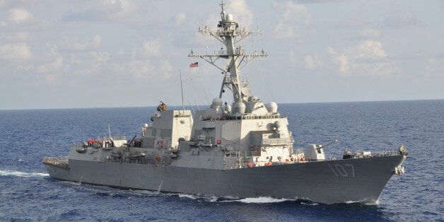 The Arleigh Burke-class guided-missile destroyer USS Gravely (DDG 107) is pictured underway during the multinational UNITAS Atlantic 53-2012 exercise conducted in the western Caribbean Sea in this September 25, 2012 handout photo. The USS Gravely is one of the four U.S. guided missile destroyers in the eastern Mediterranean Sea on standby as the Syria crisis develops. The ships can carry a maximum of 90 to 96 Tomahawk cruise missiles, each with a range of about 1,000 miles (1,610 km). REUTERS/ Lt. Cmdr. Corey Barker/U.S. Navy/Handout (MILITARY POLITICS MARITIME) THIS IMAGE HAS BEEN SUPPLIED BY A THIRD PARTY. IT IS DISTRIBUTED, EXACTLY AS RECEIVED BY REUTERS, AS A SERVICE TO CLIENTS. FOR EDITORIAL USE ONLY. NOT FOR SALE FOR MARKETING OR ADVERTISING CAMPAIGNS