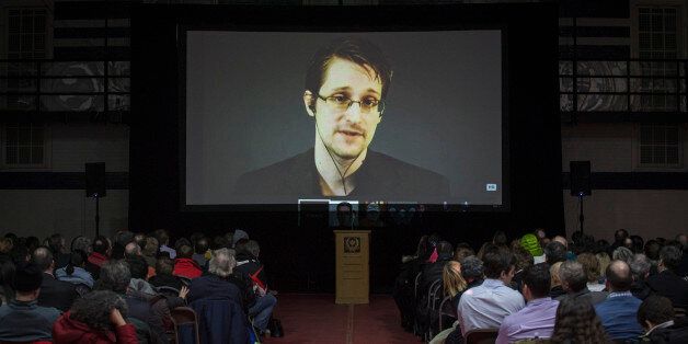 Former U.S. National Security Agency contractor Edward Snowden appears live via video during a student organized world affairs conference at the Upper Canada College private high school in Toronto, February 2, 2015. REUTERS/Mark Blinch (CANADA - Tags: POLITICS SCIENCE TECHNOLOGY EDUCATION MEDIA)