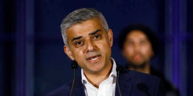 FILE - In this file photo dated Saturday, May 7, 2016, Sadiq Khan, speaks on the podium at City Hall in London, Saturday, May 7, 2016. Londonâs mayor, Khan on Sunday June 12, 2016, pledged to fight until the moment the polls close to persuade Britons to vote to remain inside the European Union bloc, in the upcoming June 23 referendum.(AP Photo/Kirsty Wigglesworth, FILE)
